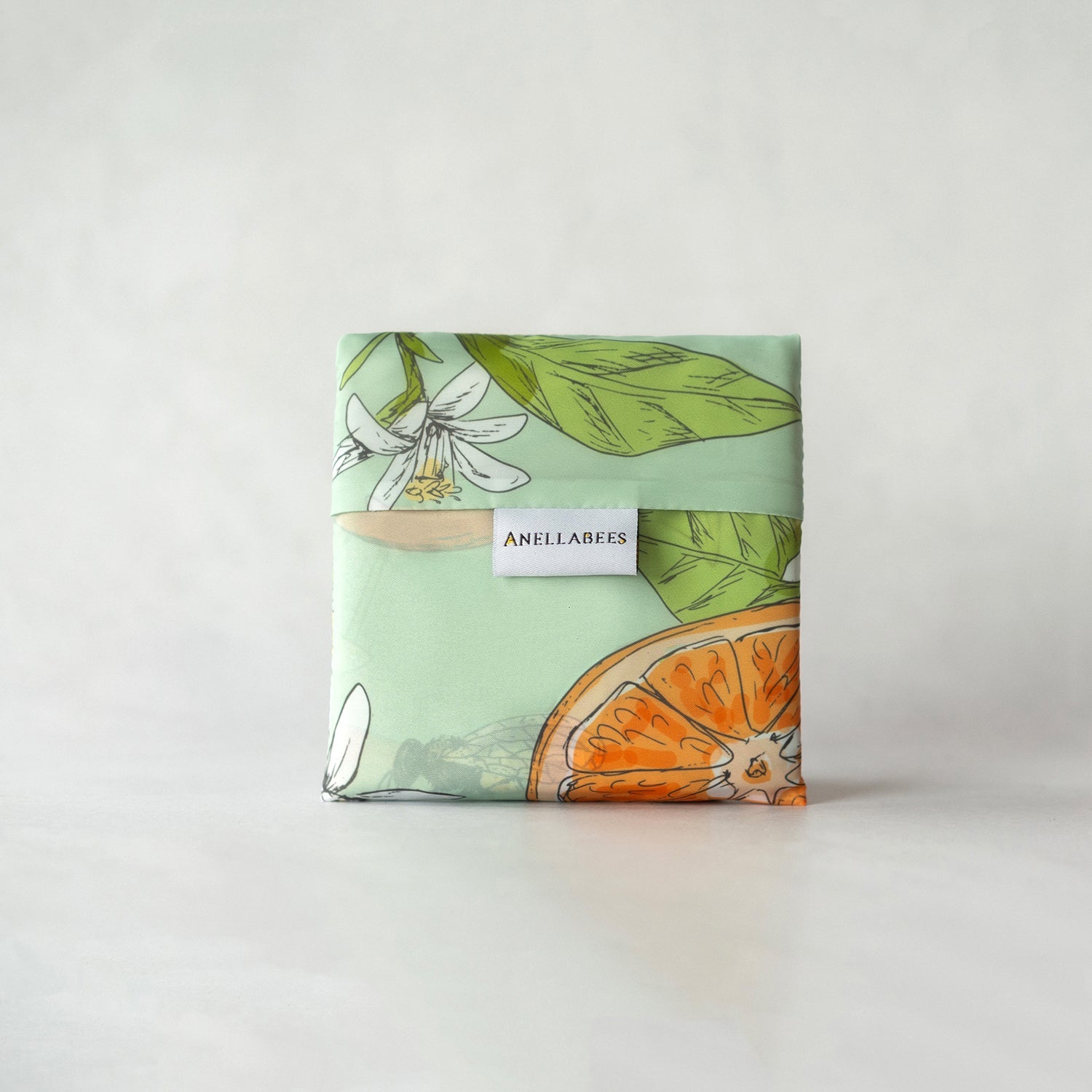 Orange blossom reusable tote bag, eco-friendly, stylish, durable for shopping and everyday use, sustainable gift option.