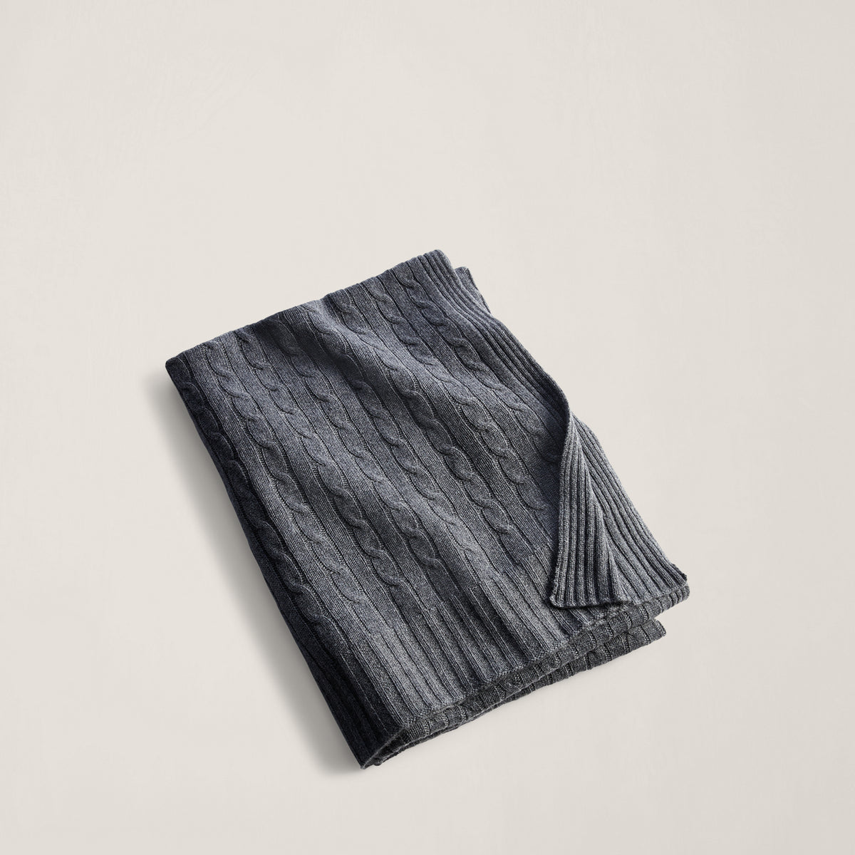 The Iconic Cable Cashmere Throw Blanket in Modern Charcoal