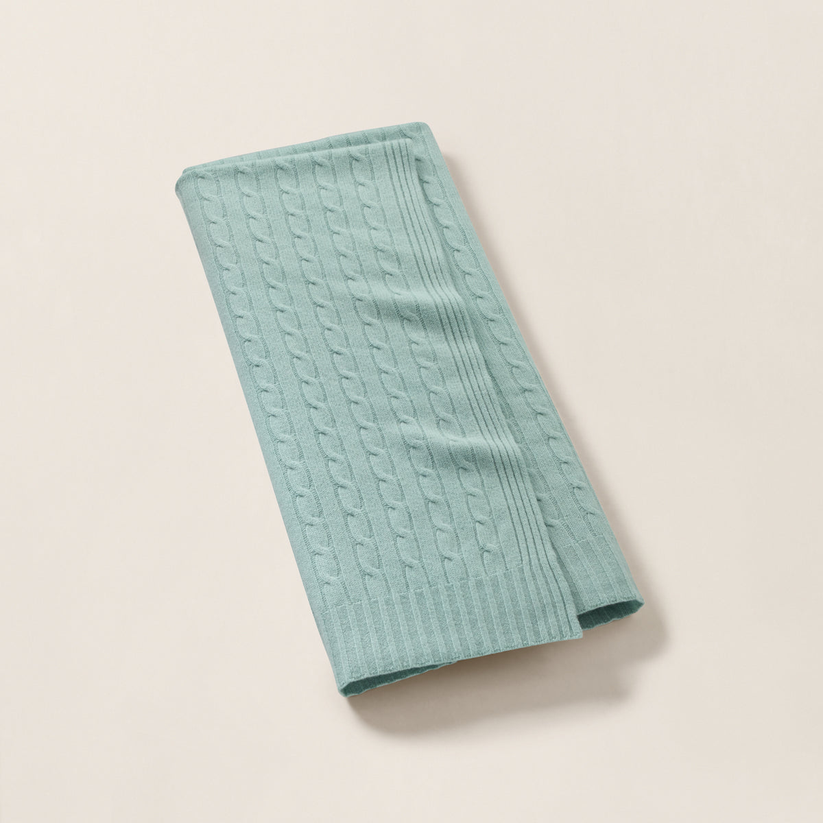 The Iconic Cable Cashmere Throw Blanket in Feldspar Green Melange